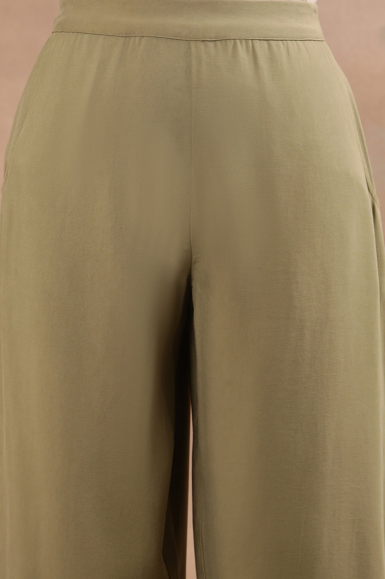 Green Sleeveless Solid Straight Kurta And Pants Set